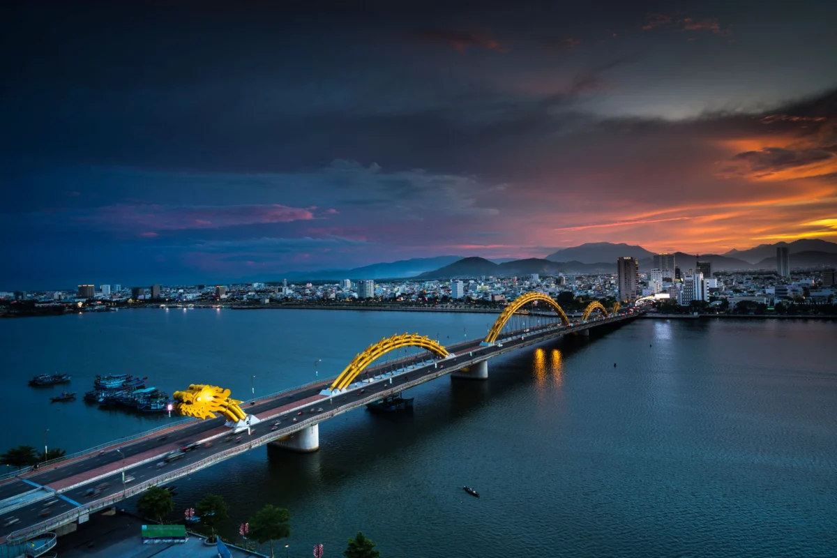 Da Nang's Dragon Bridge illuminated at sunset