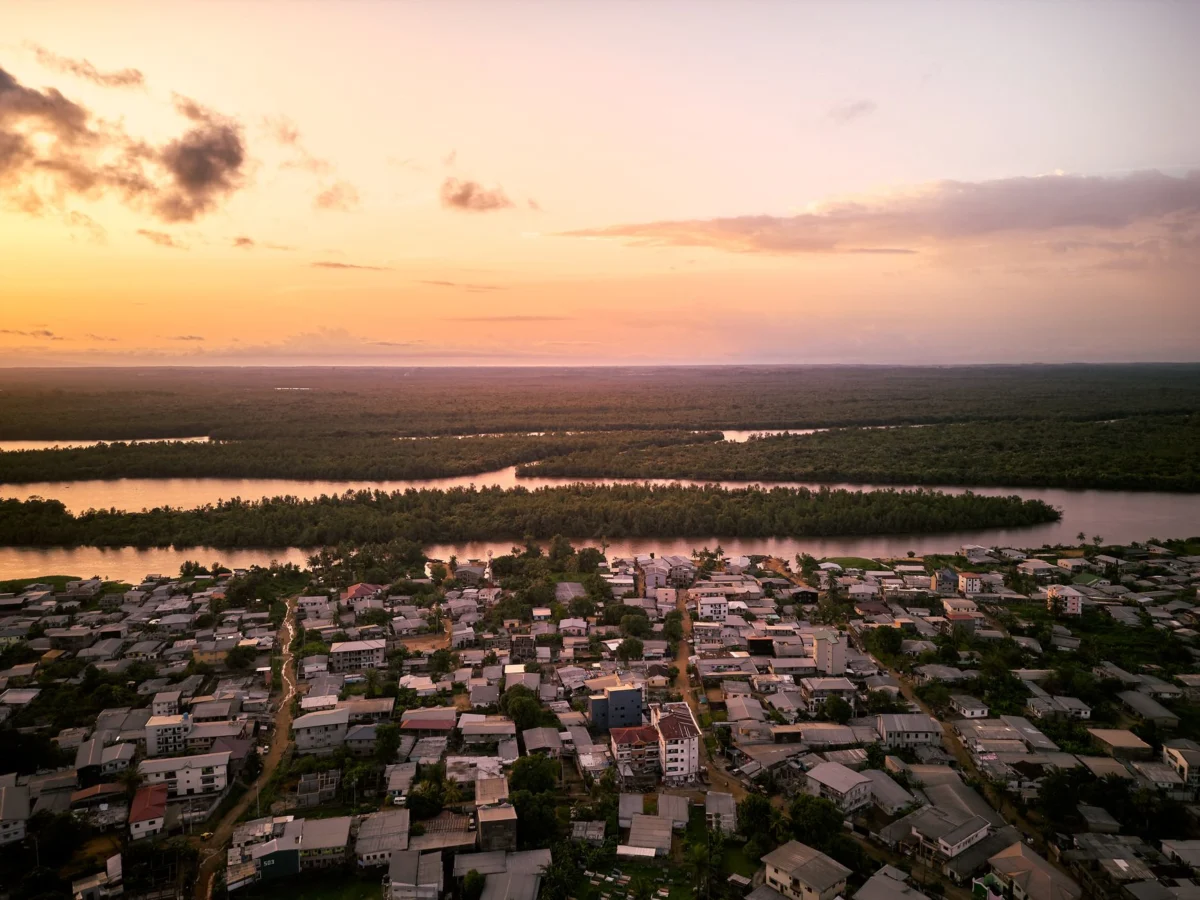 Dusk skyline of Douala with the river, highlighting romantic views