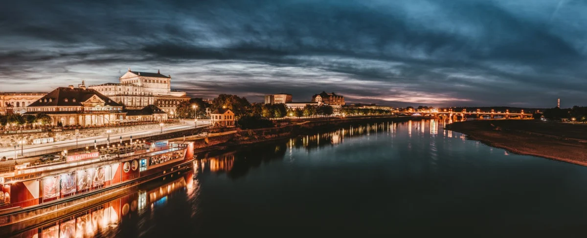 Dresden skyline at night featuring vibrant lights