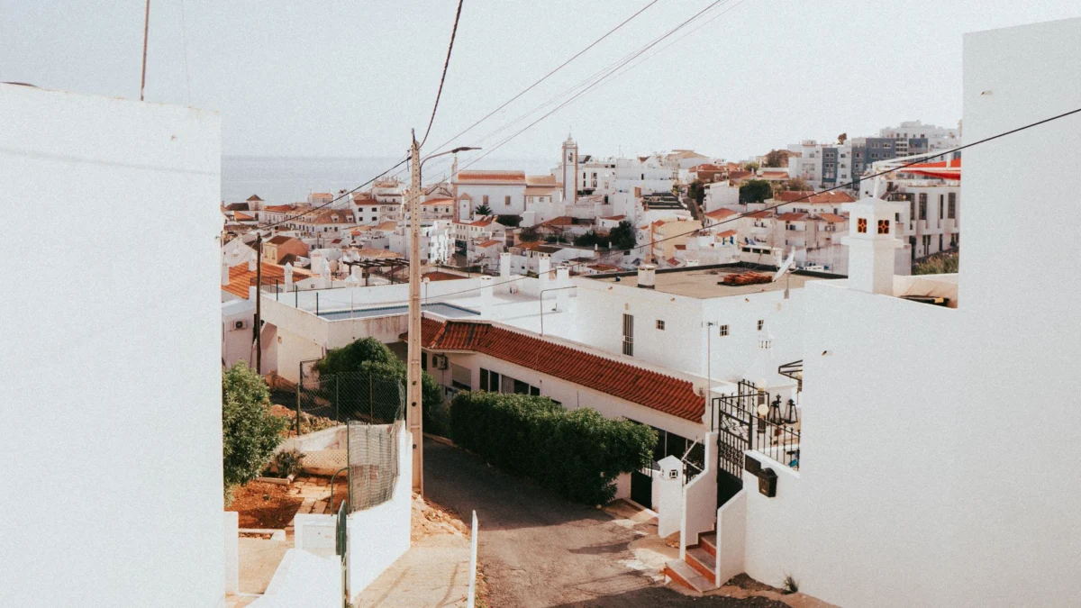 Aerial view of Faro cityscape with charming rooftops and serene atmosphere