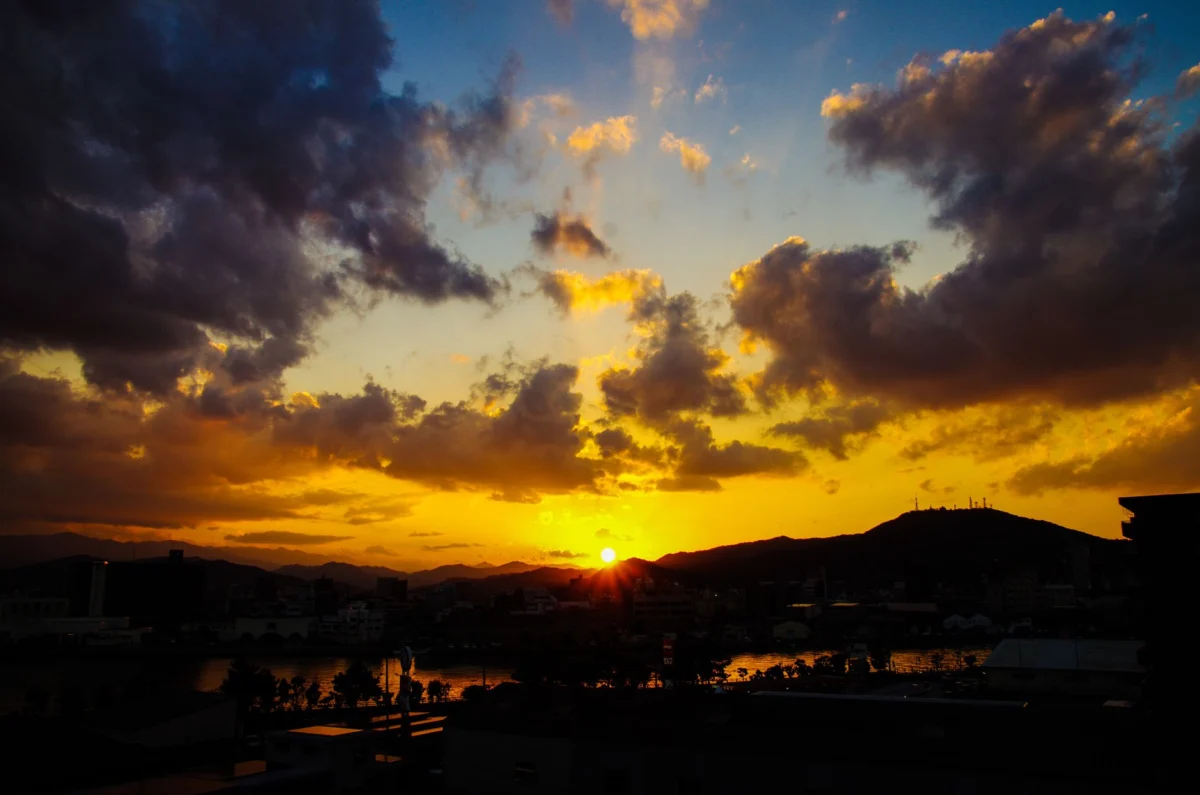 Romantic sunset view of Fukuoka skyline for luxury travelers