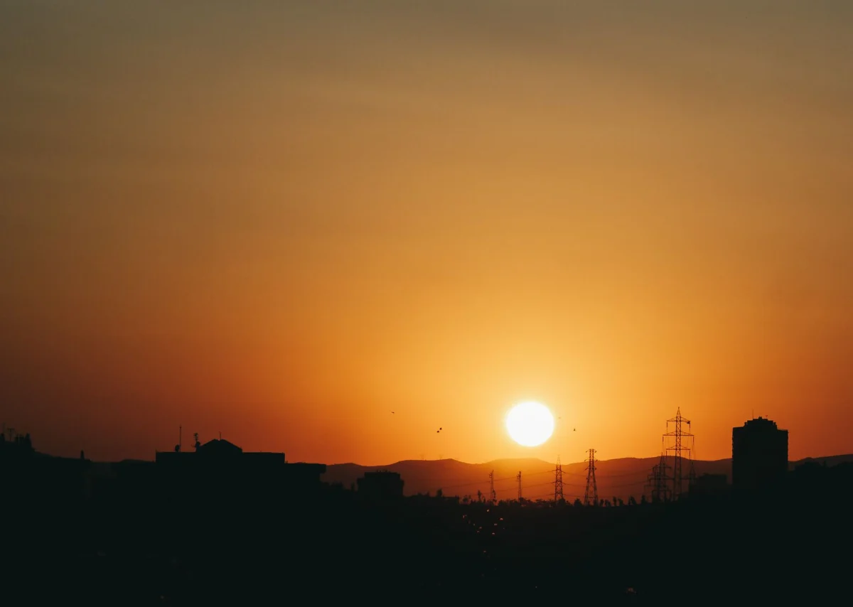 Sunset over the Gaborone skyline showcasing cultural landmarks