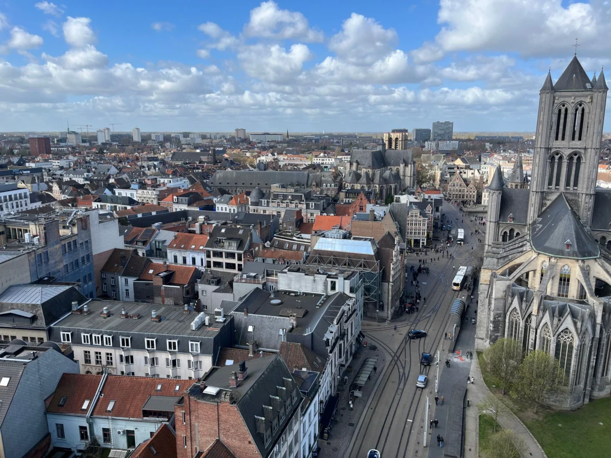 Scenic view of Ghent's historic skyline with evening lights