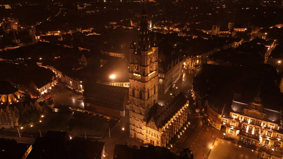 Scenic view of Ghent's illuminated skyline at night