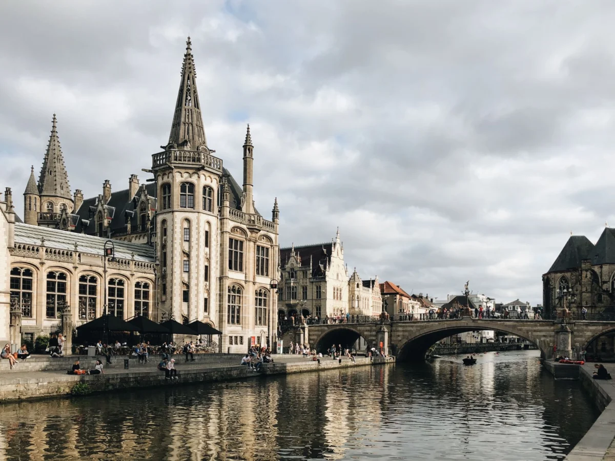 Scenic view of Ghent skyline at sunset highlighting romantic ambiance