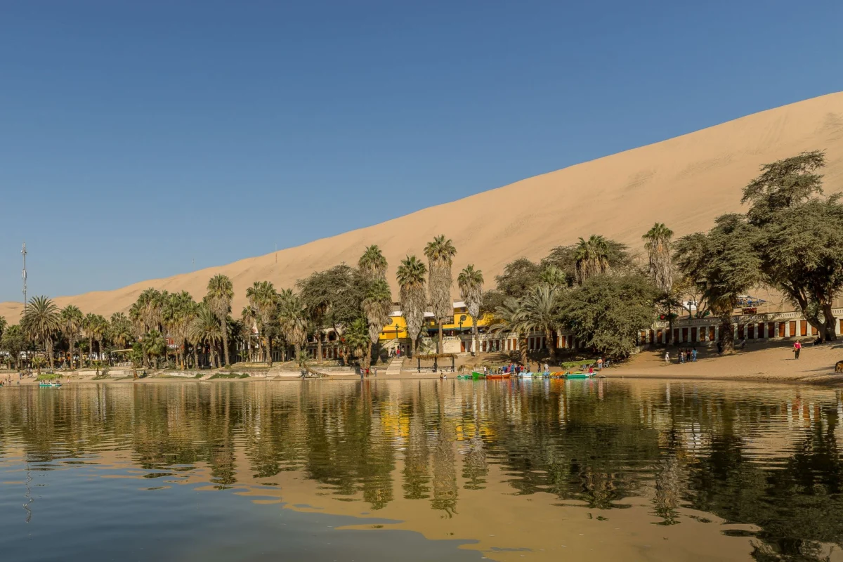 Romantic view of Huacachina's iconic sand dunes and lagoon