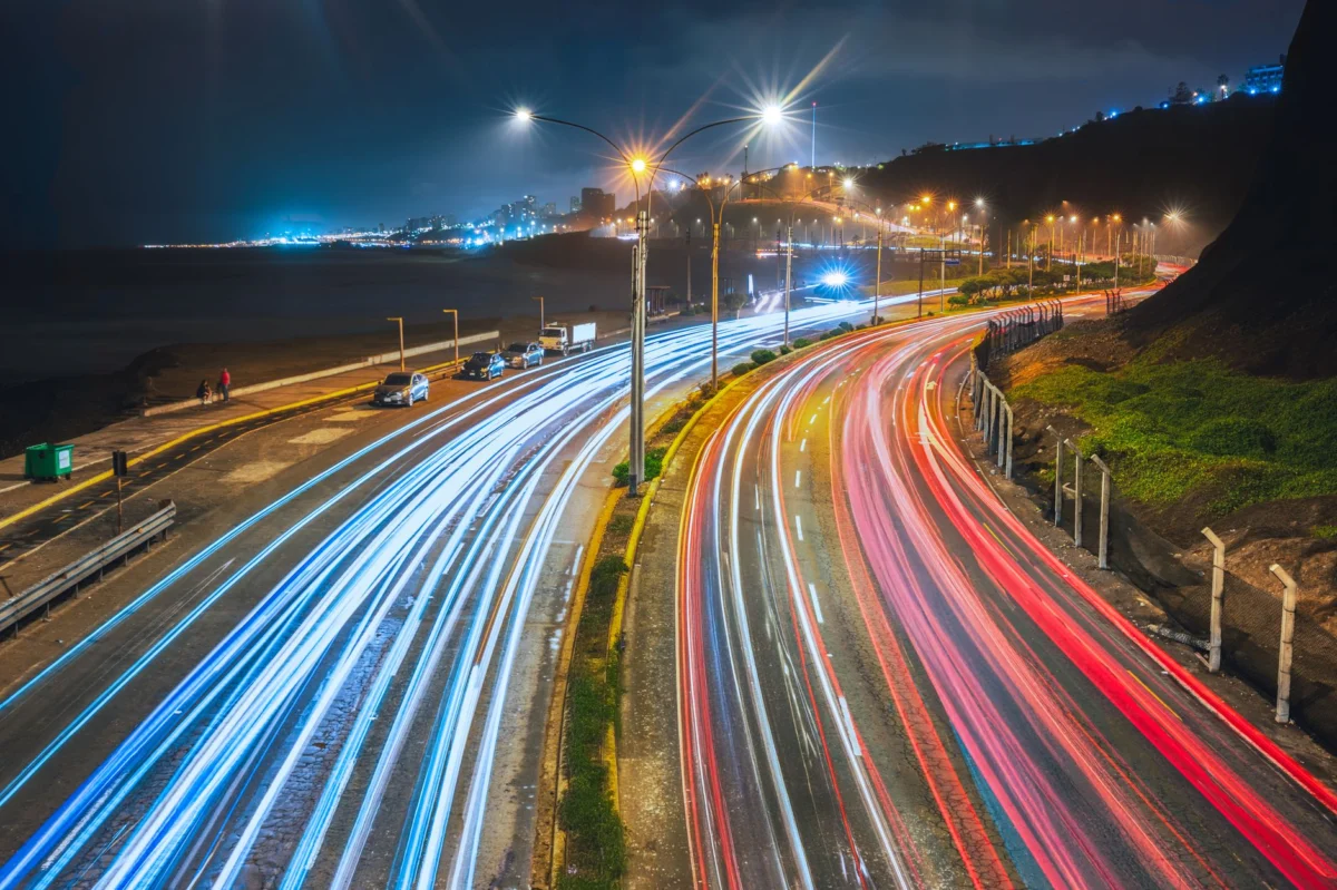 Dazzling Lima skyline illuminated against the night sky
