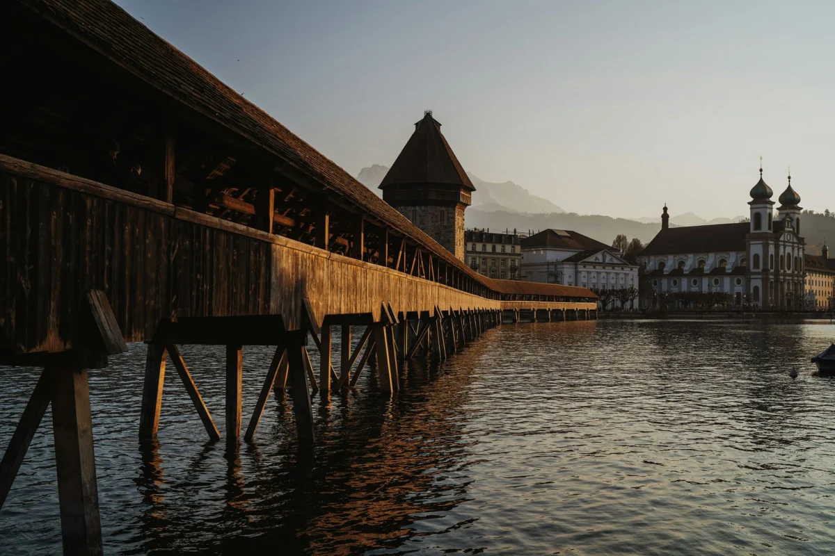 Romantic sunset view over Lake Lucerne with city backdrop