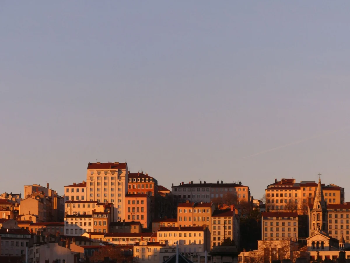 Romantic view of Lyon's skyline during sunset with iconic landmarks