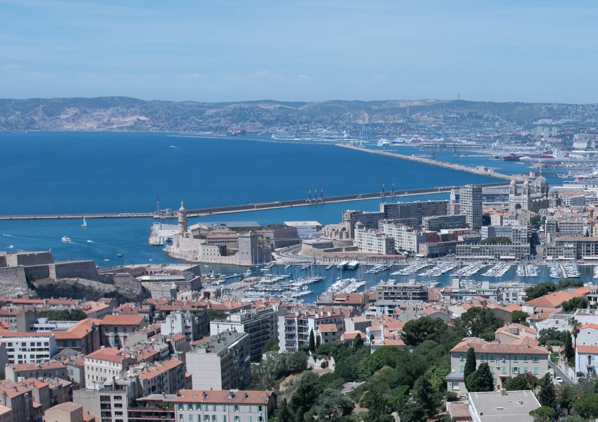 Panoramic view of Marseille's old port at sunset