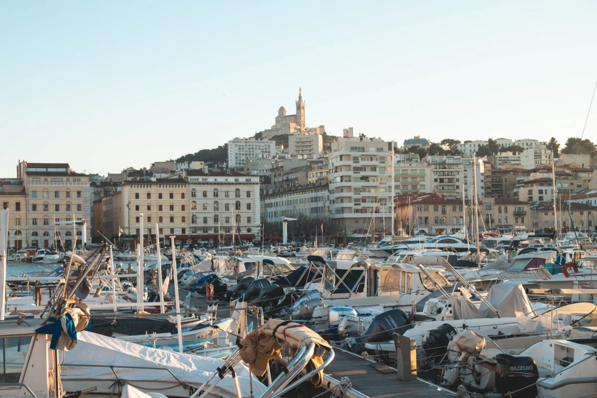Sunset view over Marseille's iconic port skyline