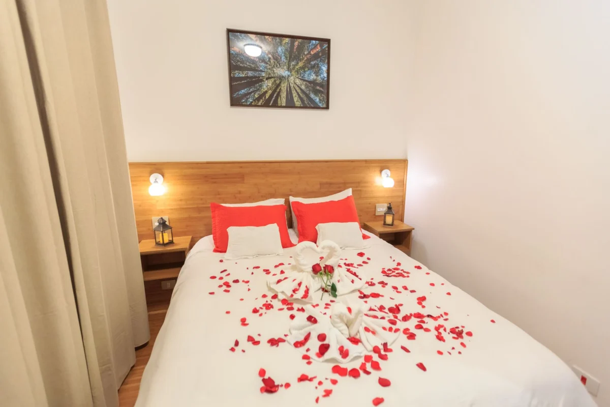 A couple's romantic hotel room with a view of Marseille