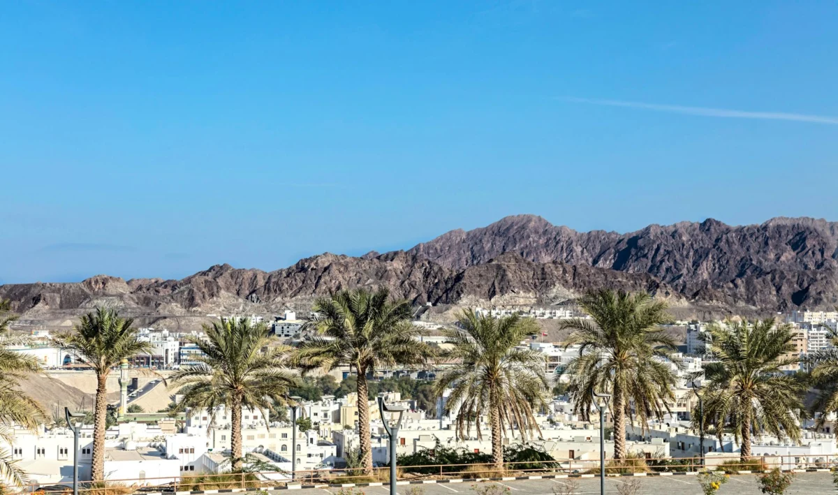 Romantic evening skyline of Muscat with city lights