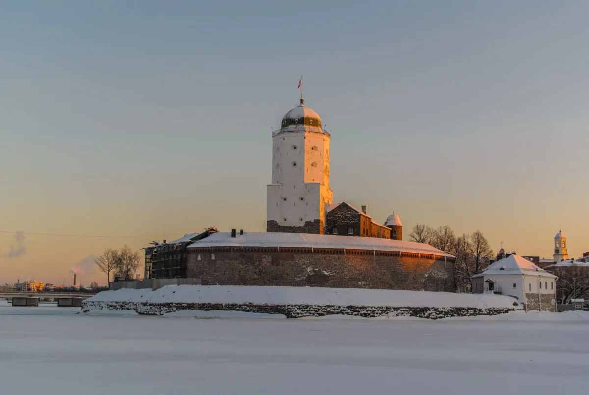 View of Narva Castle beside the river during sunset