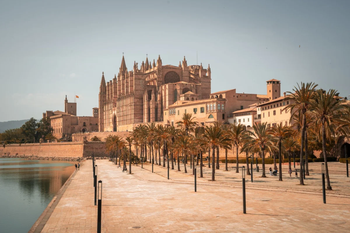 A view of Palma de Mallorca's stunning cathedral and cityscape at sunset