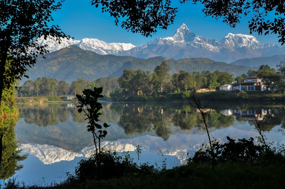 Lakeside view of Pokhara with hills and guesthouses