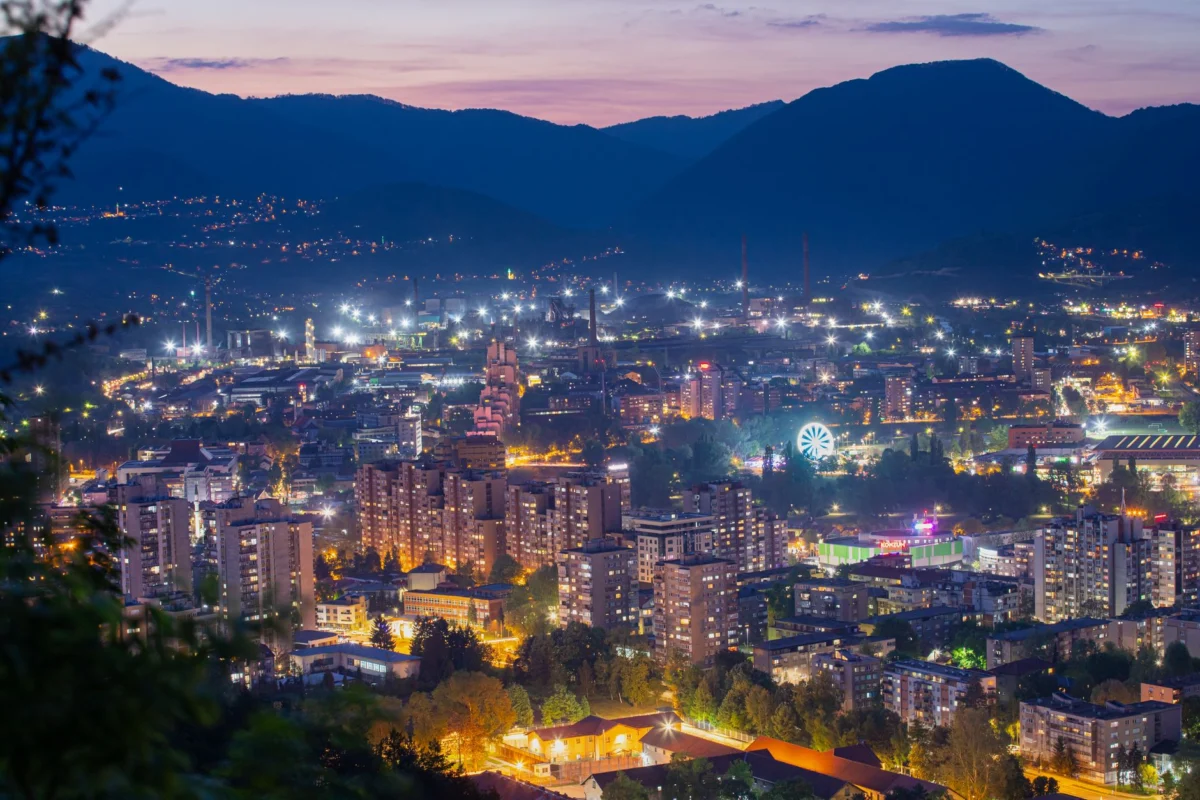 Evening view of Pristina skyline with cultural landmarks