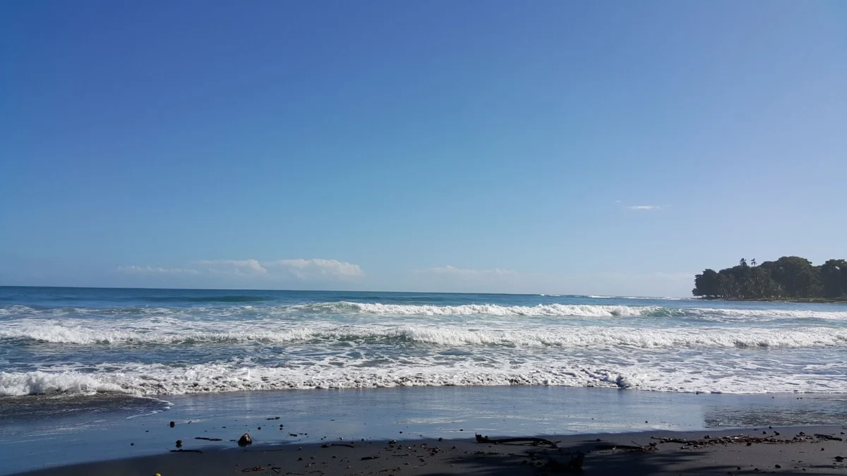 Romantic beach scene in Puerto Viejo with sunset view