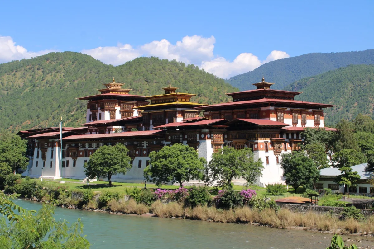 Punakha Dzong and surrounding mountains at sunset