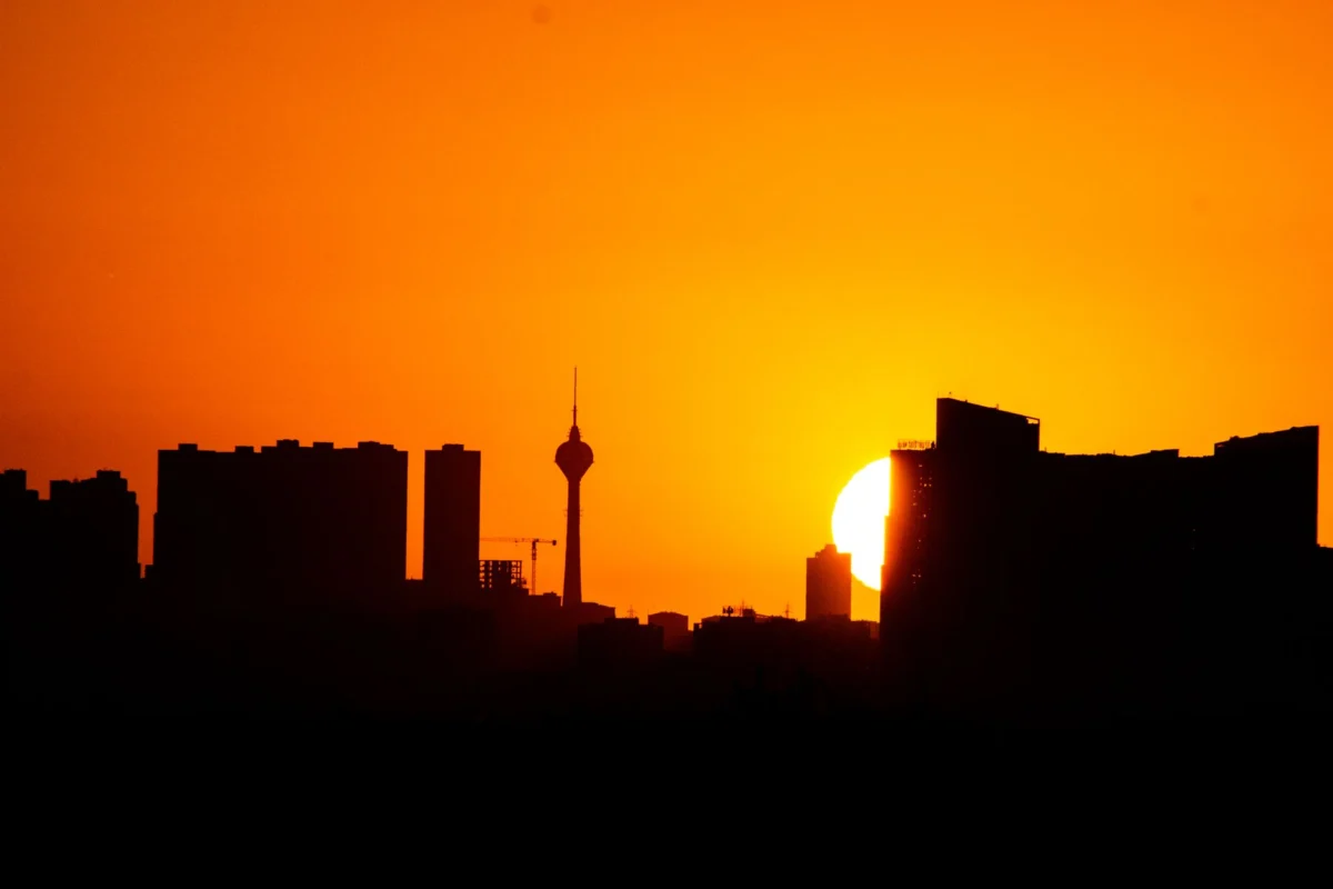 Scenic view of Rasht skyline with a romantic sunset backdrop