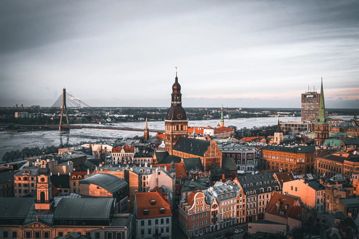 A breathtaking sunset over Riga's romantic old town skyline