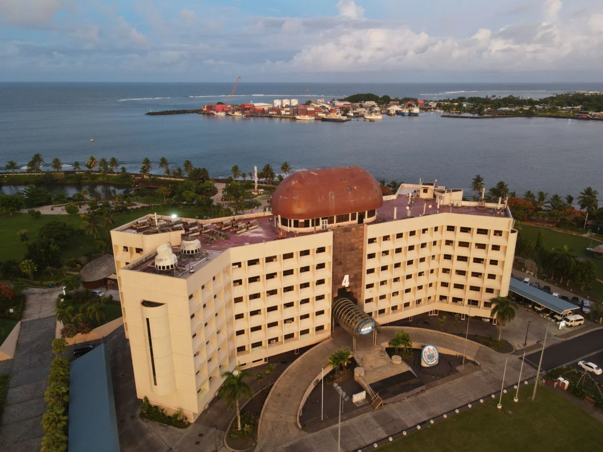 Couple enjoying a romantic stay in a luxurious Apia hotel room