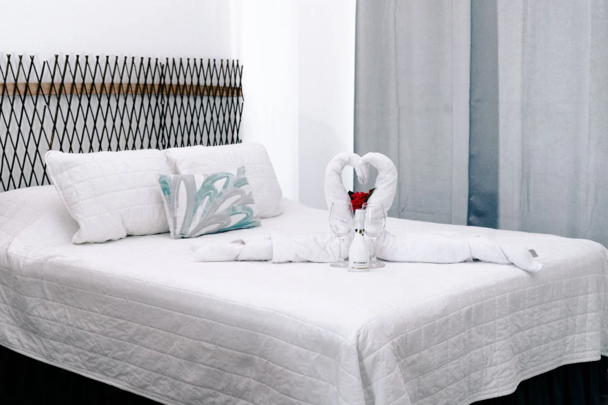 Romantic hotel room overlooking Seven Mile Beach's serene coast