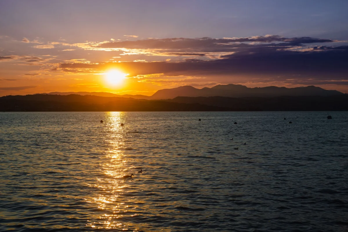 View of Lake Assal at sunset with historical elements
