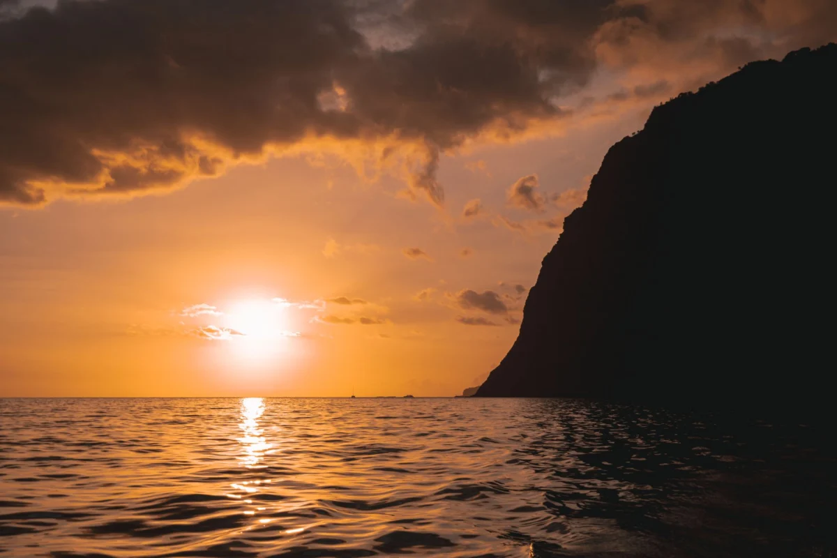 A scenic sunset view of Madeira's romantic coastline