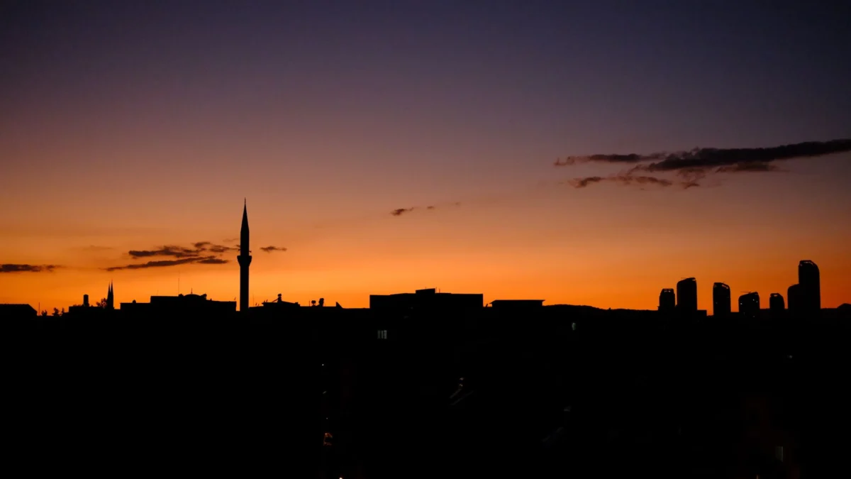 Romantic view of Rasht's illuminated skyline at twilight
