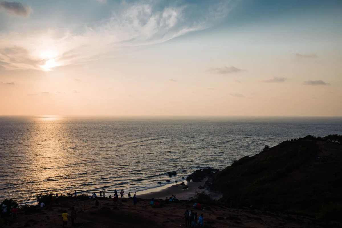 Couple enjoying a romantic sunset at a Goa beach