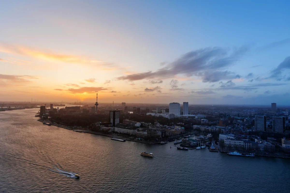 View of Rotterdam skyline with famous landmarks at dusk