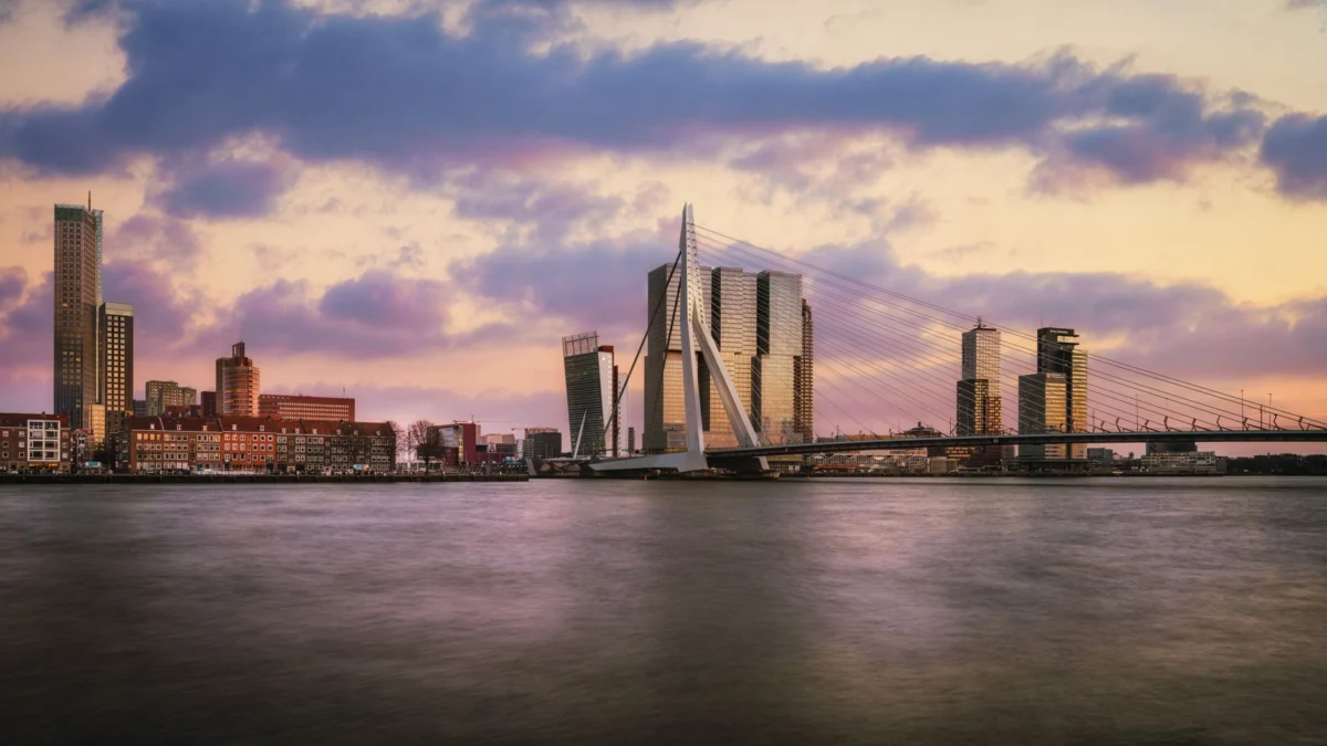 Sunset over the Rotterdam skyline showcasing the city's rich history and culture