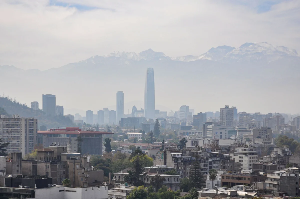 Panoramic view of Santiago's skyline with mountains
