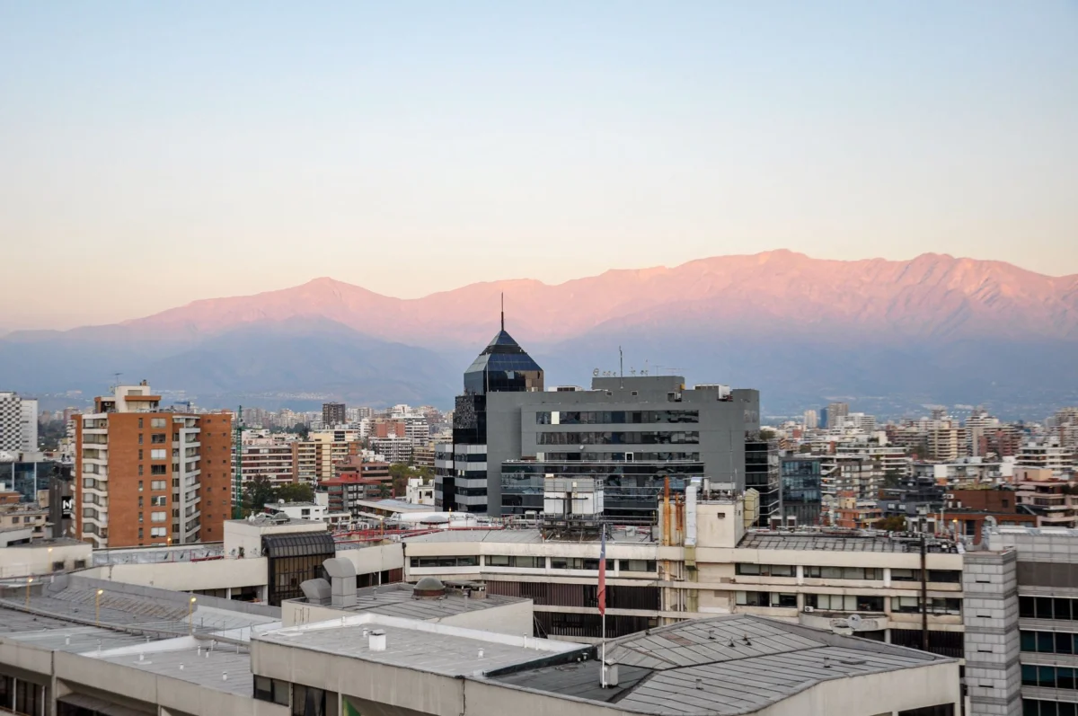 Romantic evening skyline of Santiago showcasing city lights