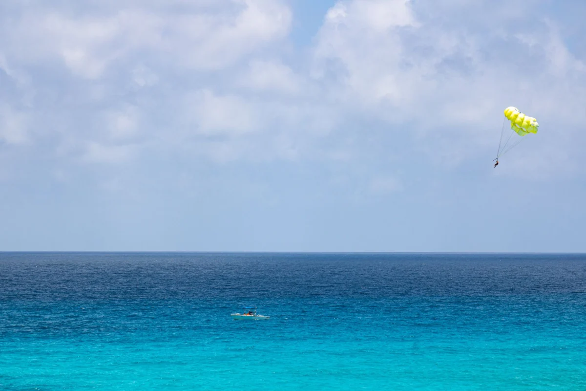 Panoramic view of Seven Mile Beach with clear blue waters
