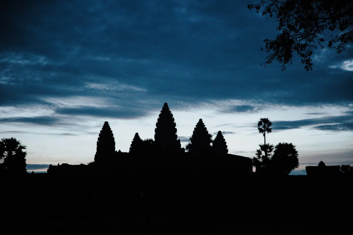 Illuminated cityscape of Siem Reap at dusk highlighting key landmarks
