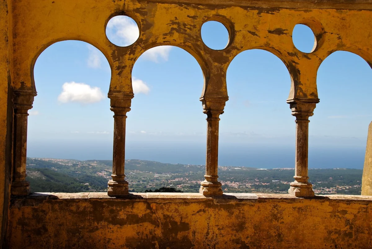 Stunning view of Sintra's iconic castle against a vibrant sky