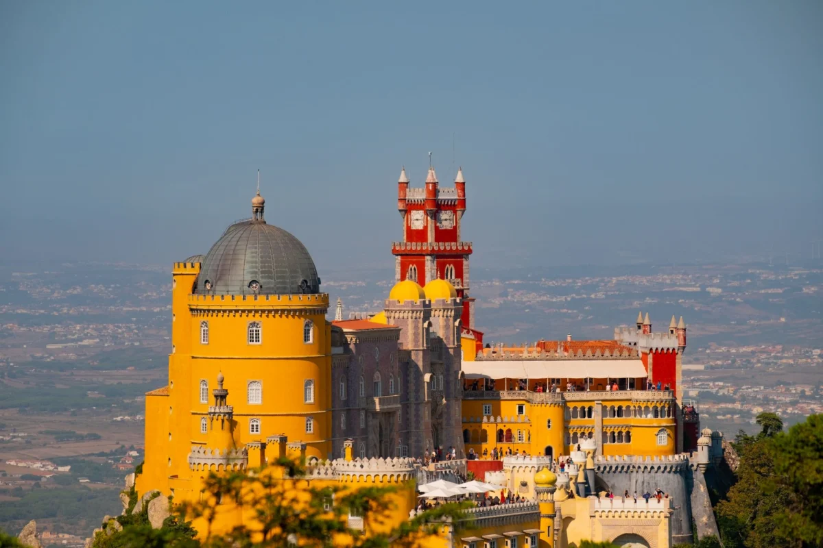 Scenic view of Sintra's iconic castle nestled in verdant hills