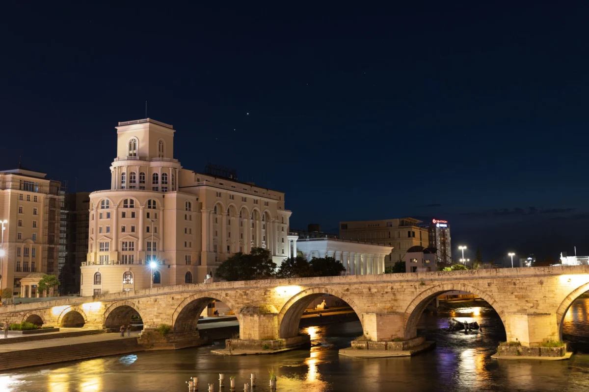 View of Skopje skyline at night with illuminated landmarks