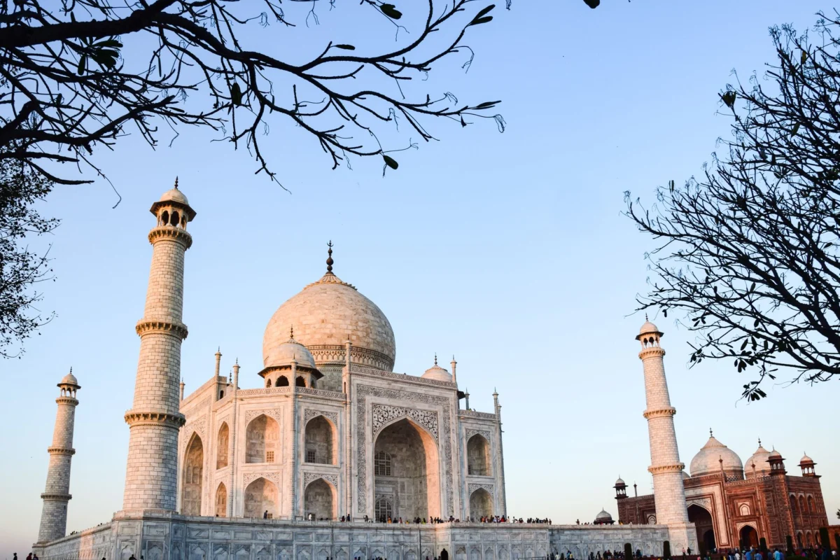 Couple enjoying sunset view of Taj Mahal in Agra