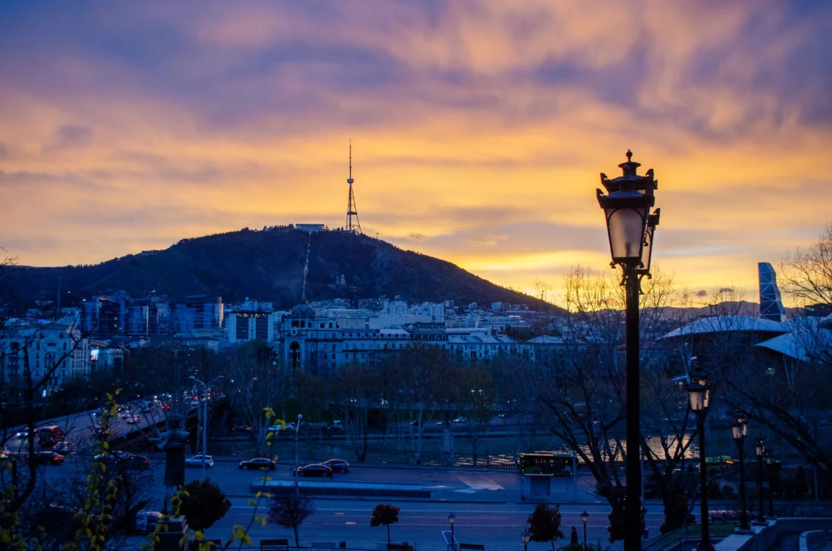 Enchanting sunset over Tbilisi's vibrant cityscape and landmarks