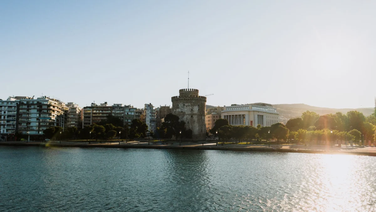 Stunning sunset over Thessaloniki cityscape showcasing landmarks
