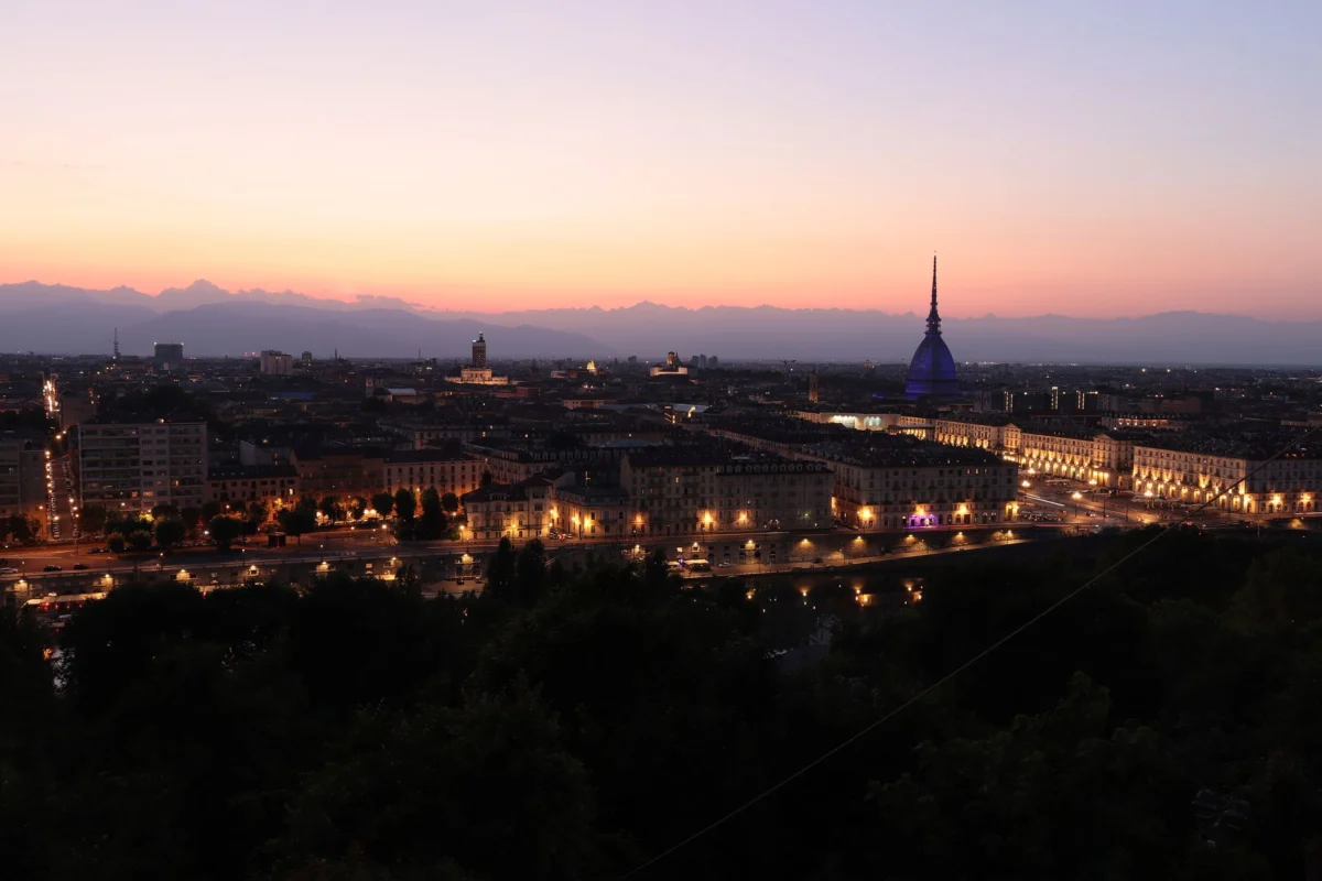 Romantic sunset view of Turin skyline with iconic landmarks