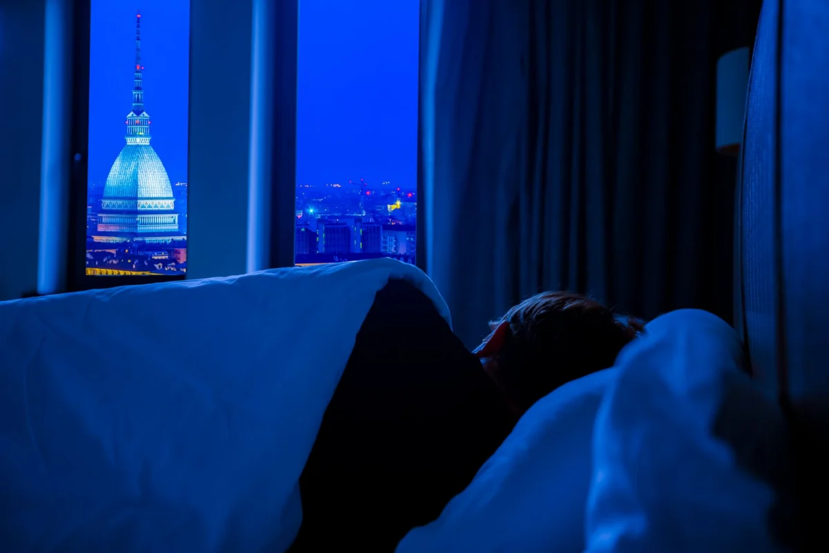 Scenic view from a romantic hotel room in Turin with city skyline