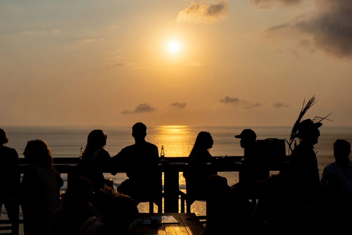 Romantic sunset view over the cliffs and beaches of Uluwatu