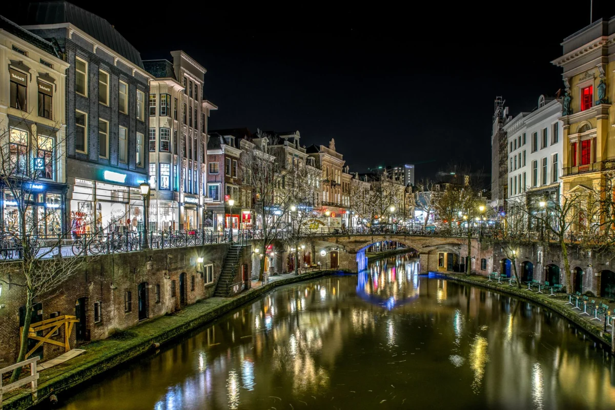 Scenic sunset over Utrecht's historic canals and buildings