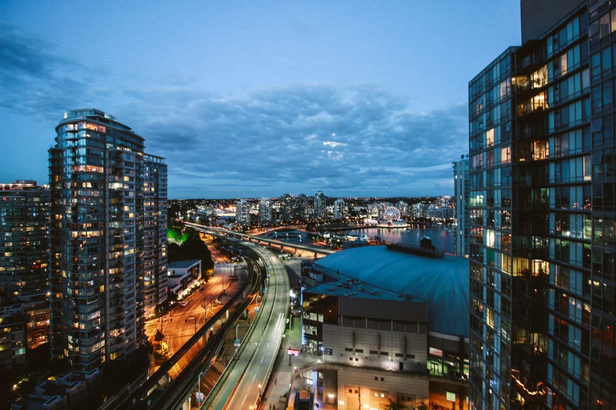 Vancouver skyline at night showcasing iconic buildings