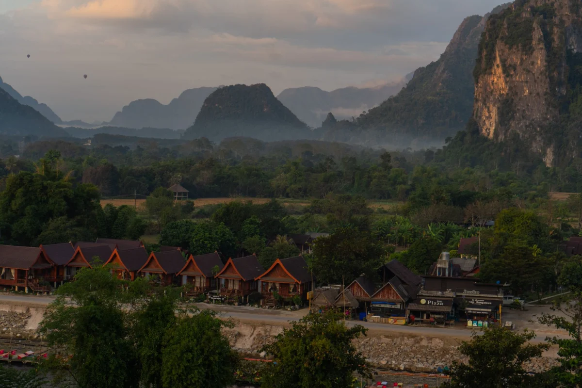 Romantic sunset view over the serene landscape of Vang Vieng