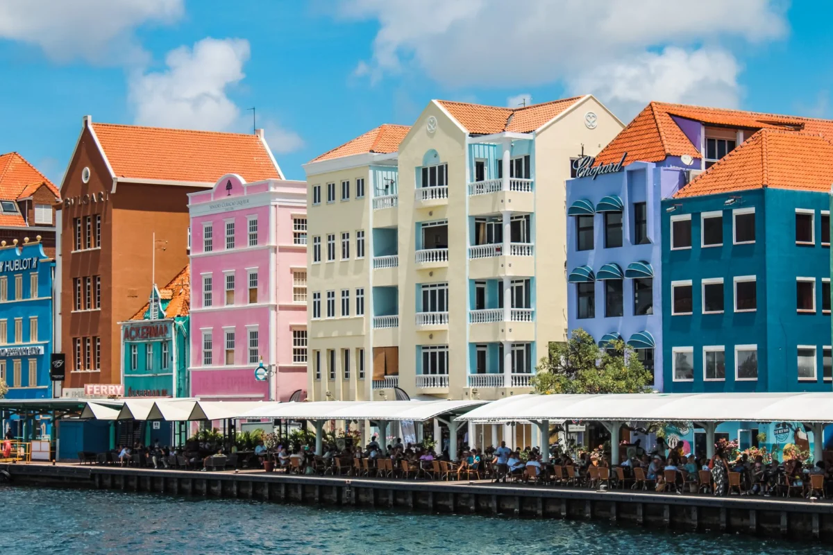 Vibrant buildings reflecting in Willemstad harbor